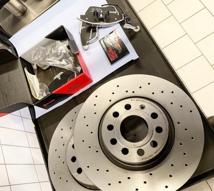 New Brembo brake discs and pads ready for fitting