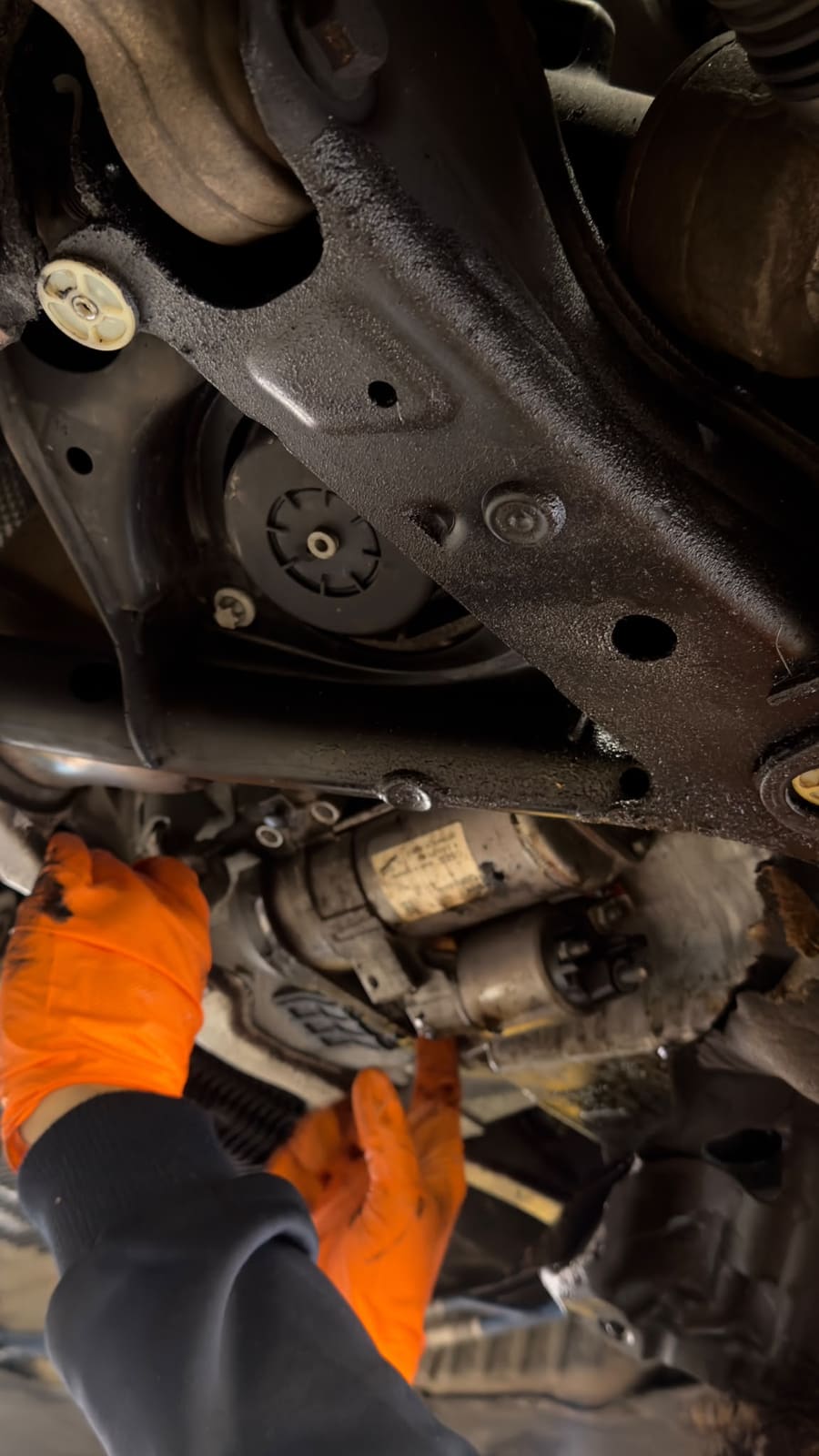 Suspension and subframe work from underneath the vehicle